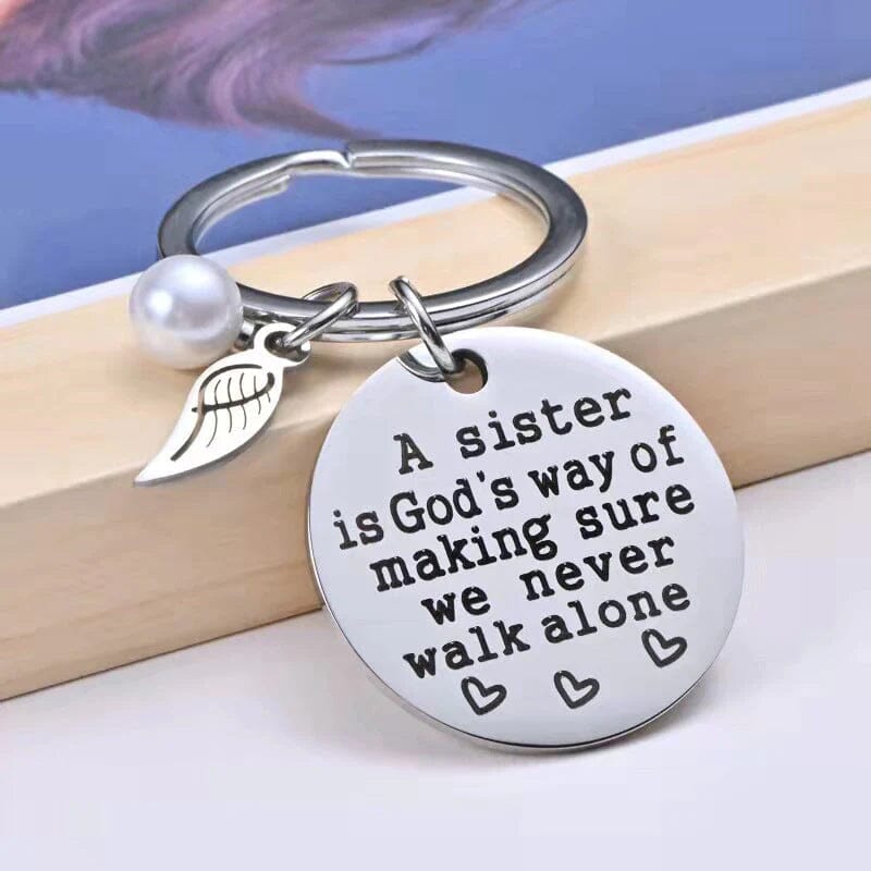 A Sister is God's Way of Making Sure We Never Walk Alone Keychain